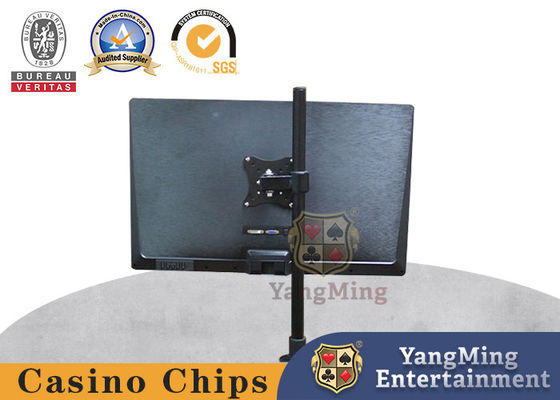 Un display giratorio ajustable negro para jugar a las cartas en la mesa del casino.